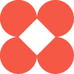 Vier rooi-oranje sirkels gerangskik in 'n vierkantige formasie, met elke sirkel se rand wat aan die ander raak, wat 'n wit diamantvorm in die middel vorm waar hulle ontmoet. Die agtergrond is liggrys.